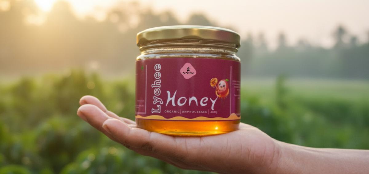 A bottle of Lychee Honey in a luxurious setting